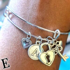 bite & pout "E" Silver Initial Bangle
